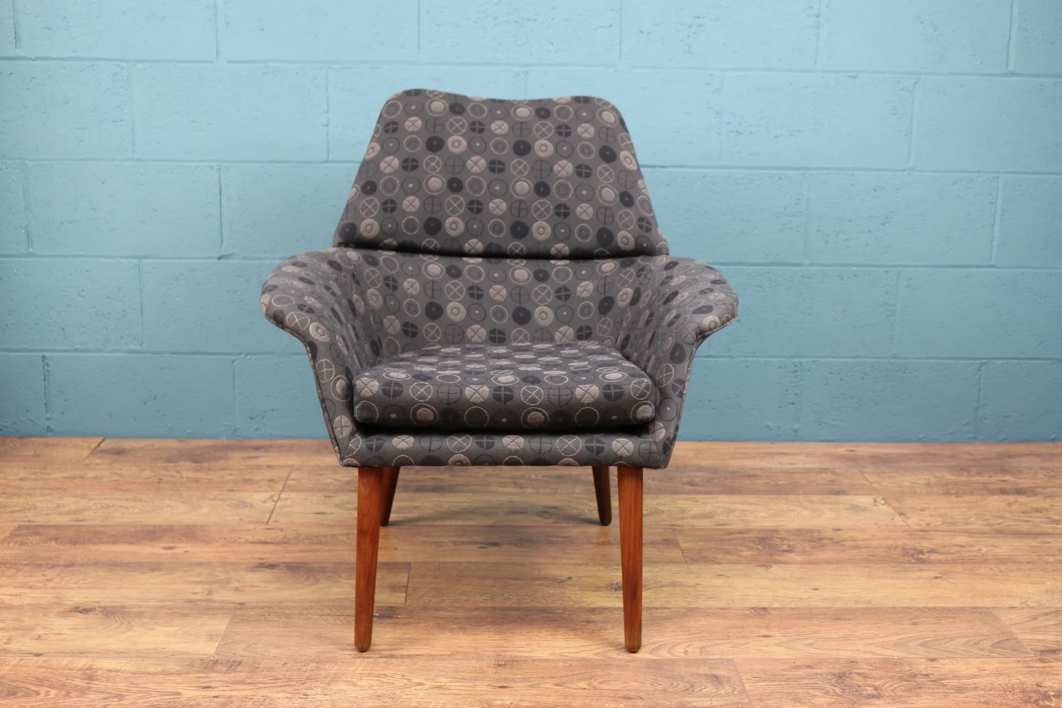 Mid century Danish armchair upholstered in George Nelson textile.
