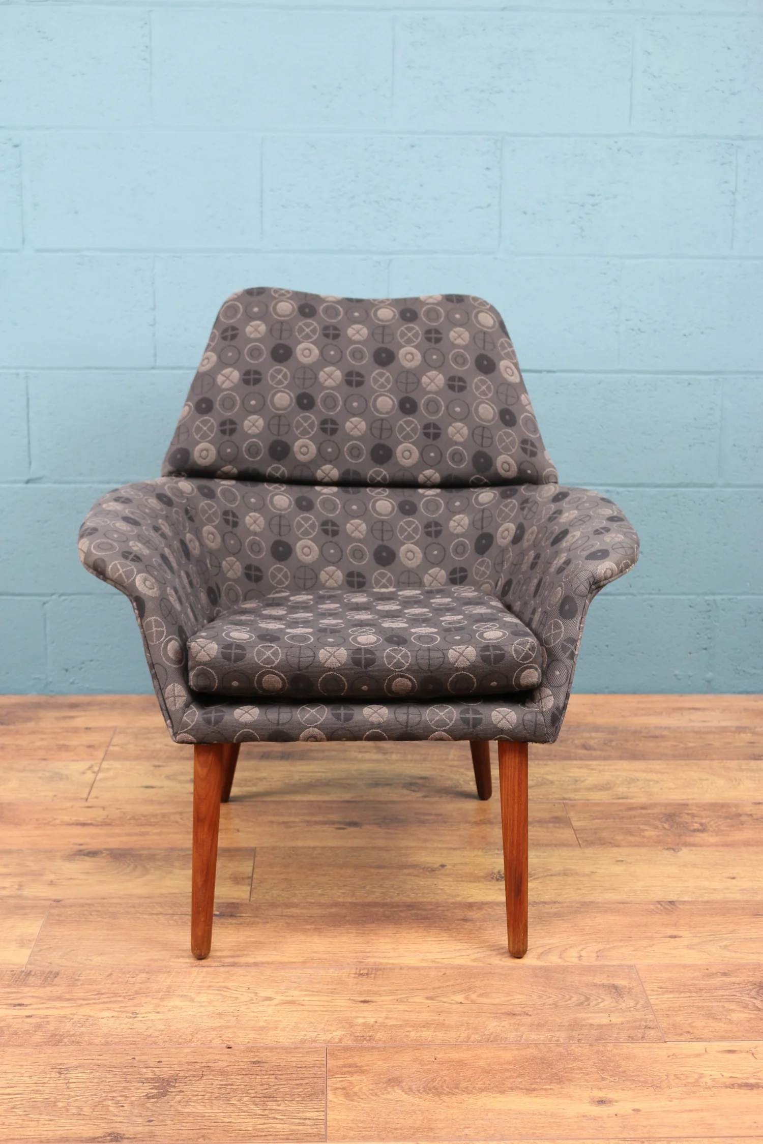 Mid century Danish armchair upholstered in George Nelson textile.