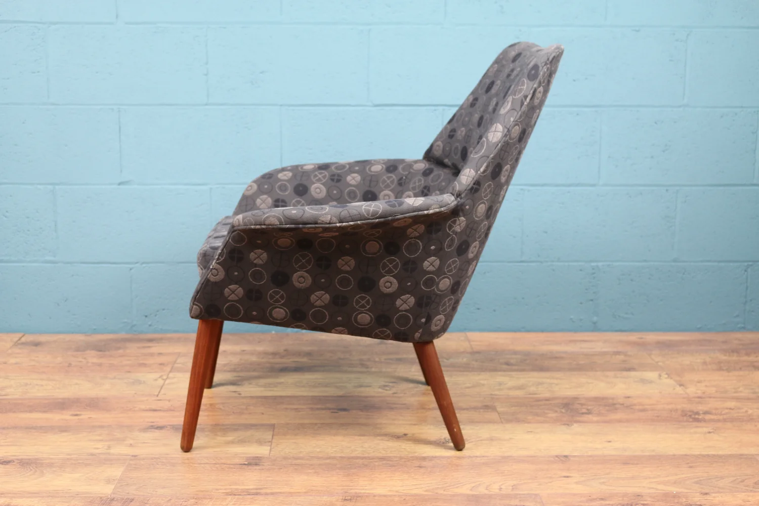 Mid century Danish armchair upholstered in George Nelson textile.