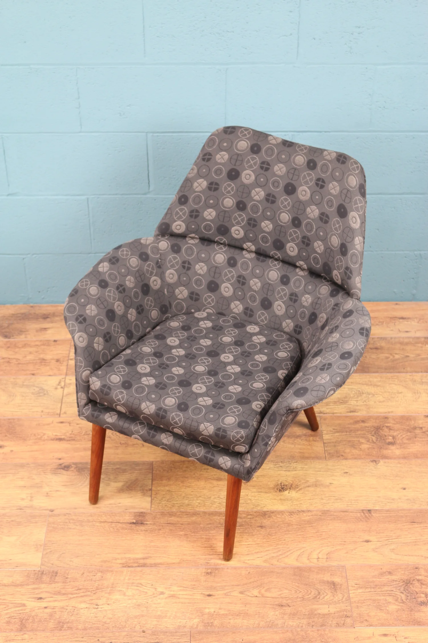 Mid century Danish armchair upholstered in George Nelson textile.
