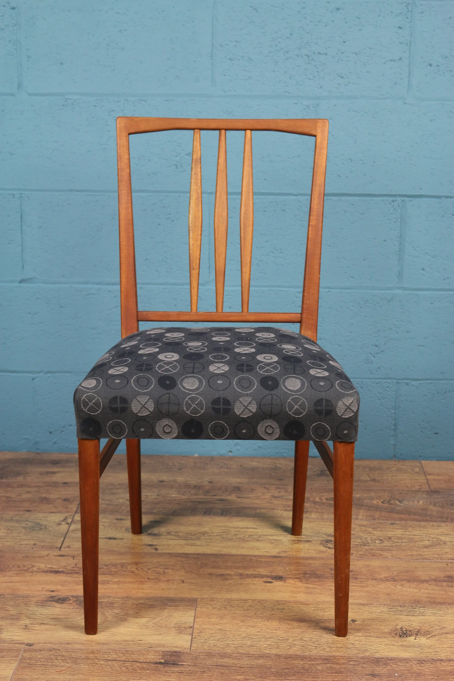 Gordon Russell dining chairs (model 6409) designed by W.H. "Curly" Russell, c1954.