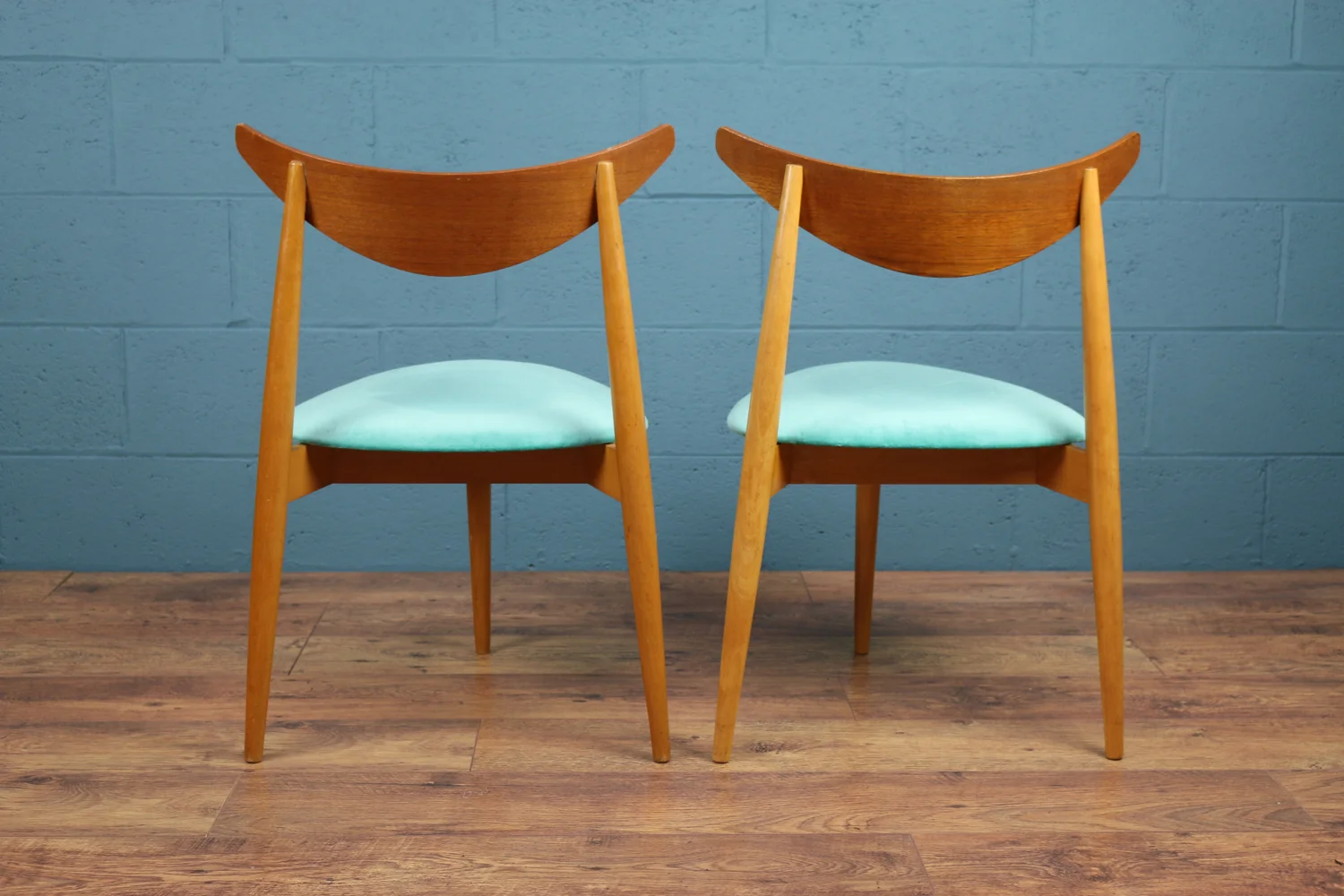 G-Plan three-legged dining chairs by Richard Young