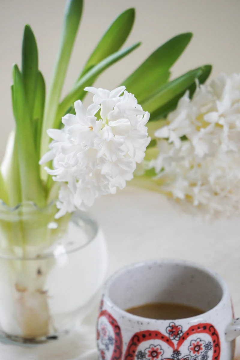 Quiet mornings paired with coffee and fresh flowers