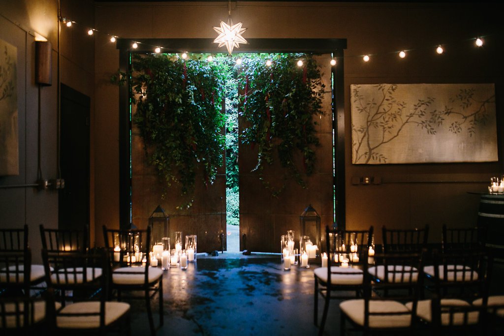 Intimate indoor wedding ceremony at JM Cellars in Seattle