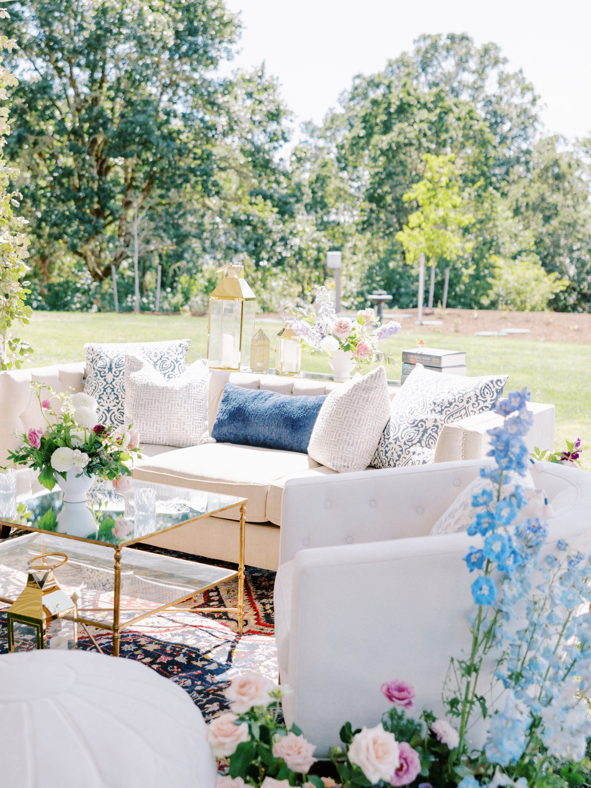 Outdoor seating at a wedding reception by wedding planning service Bridal Bliss.