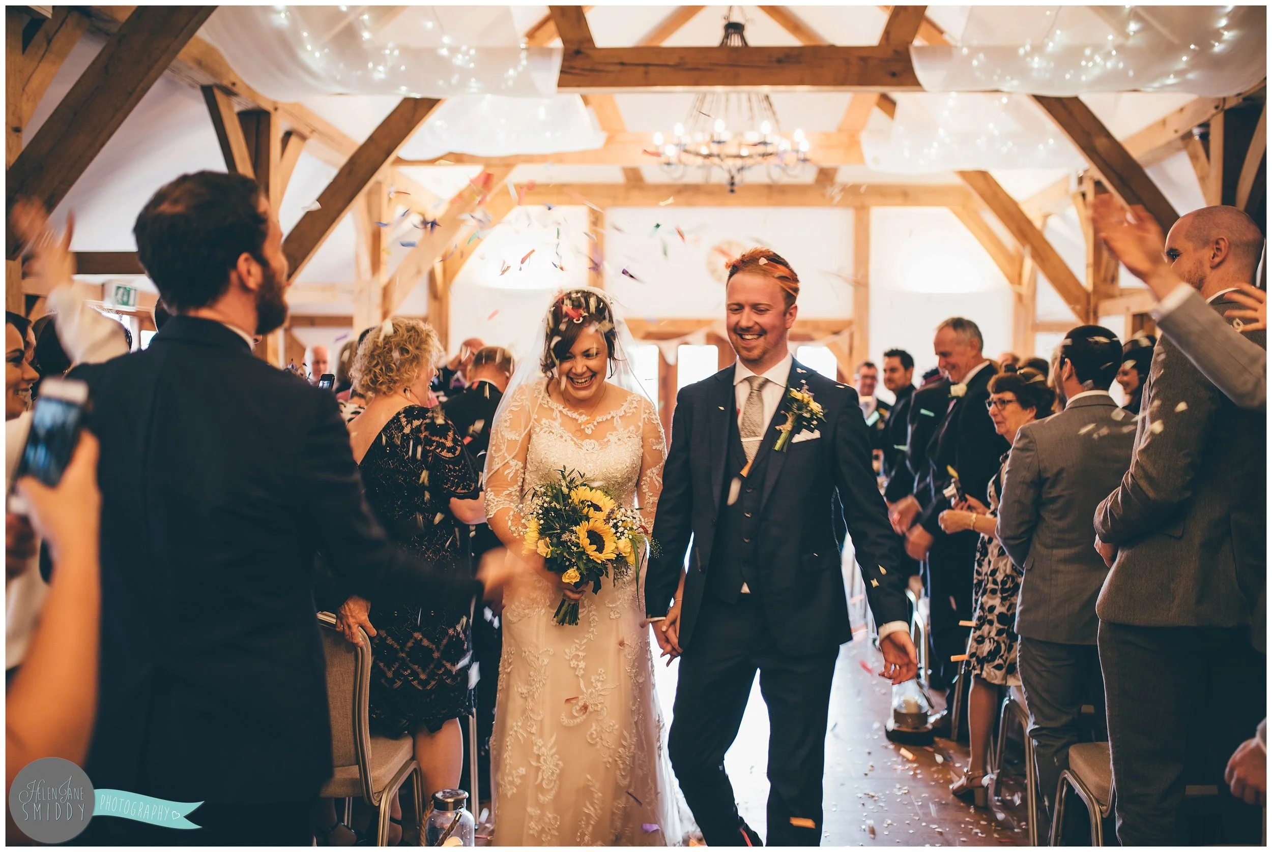 cheshire-cheshirewedding-cheshireweddingphotographer-cheshire-wedding-photographer-sandhole-oak-barn-sandholeoakbarn-wedding-photography-weddingphotography-bride-groom-brideandgroom-relaxed-rustic-wedding-sunflowers-bouncy-castle-DIY