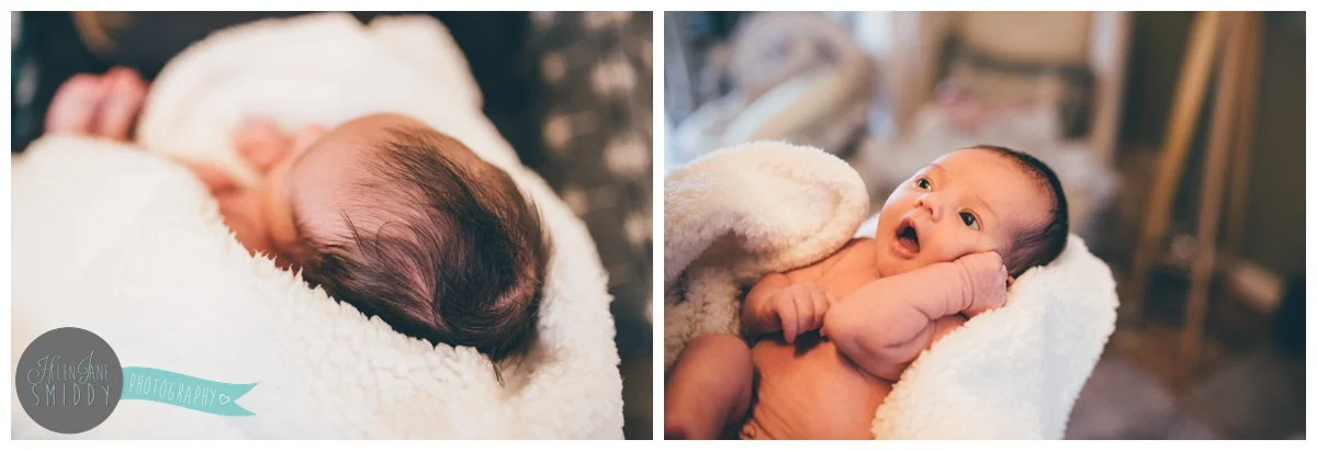 Newborn baby girl's full head of black hair.