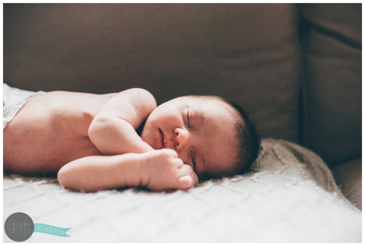Newborn photoshoot with a Frodsham photographer witha sleeping baby girl.