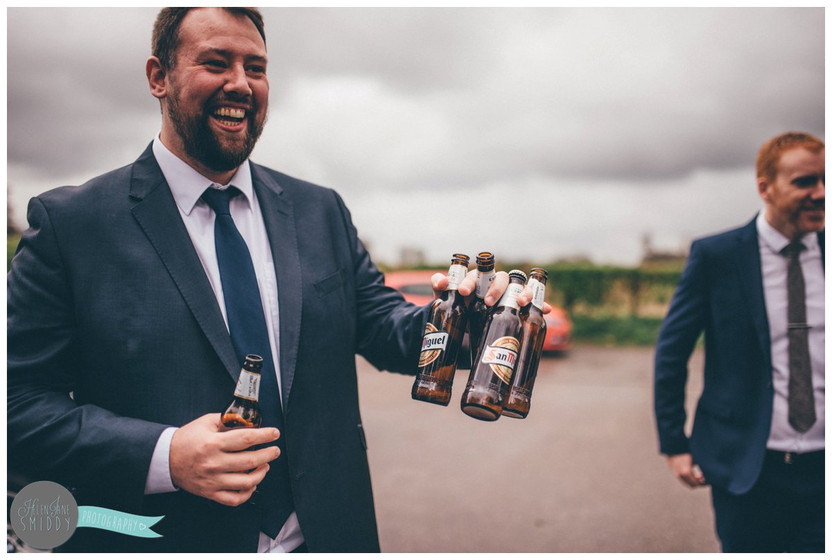 All the empty beer bottles are handed to the wedding guest before the wedding.