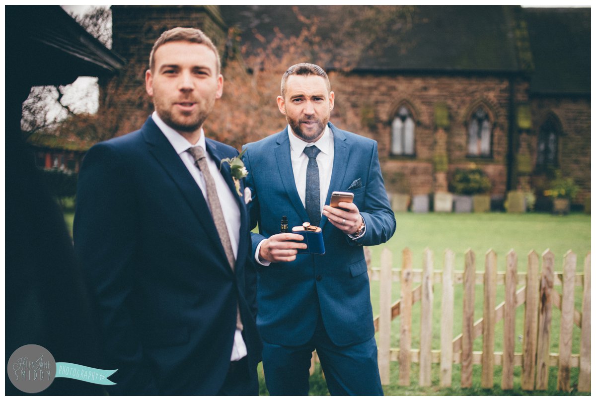 The guys look right at the cheshire wedding photographer before the ceremony.