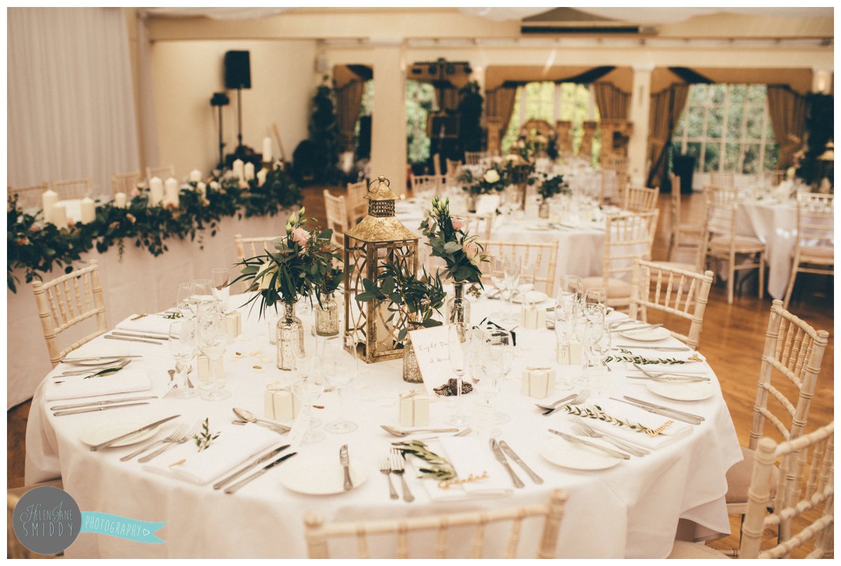 The table was decorated with beautiful greenery and rustic woodwork.