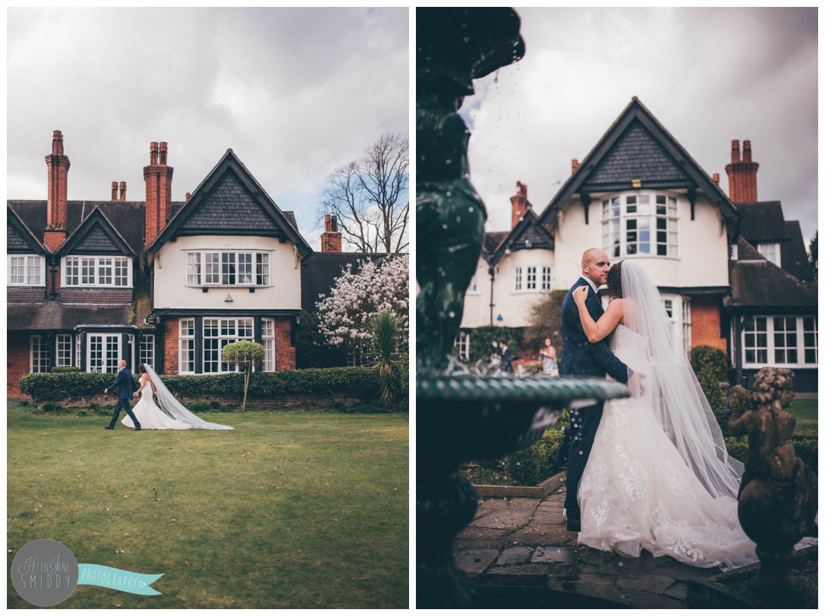 Lyssa and Dom hug next to the beautiful fountain at Mere Court Hotel, in the front garden.