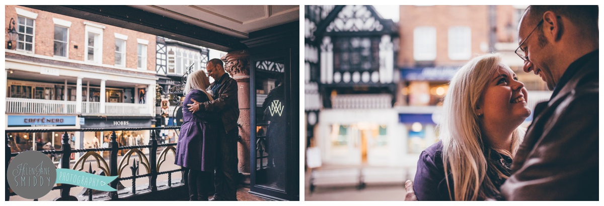 The couple stand on the rows against the railings in Chester, Cheshire.