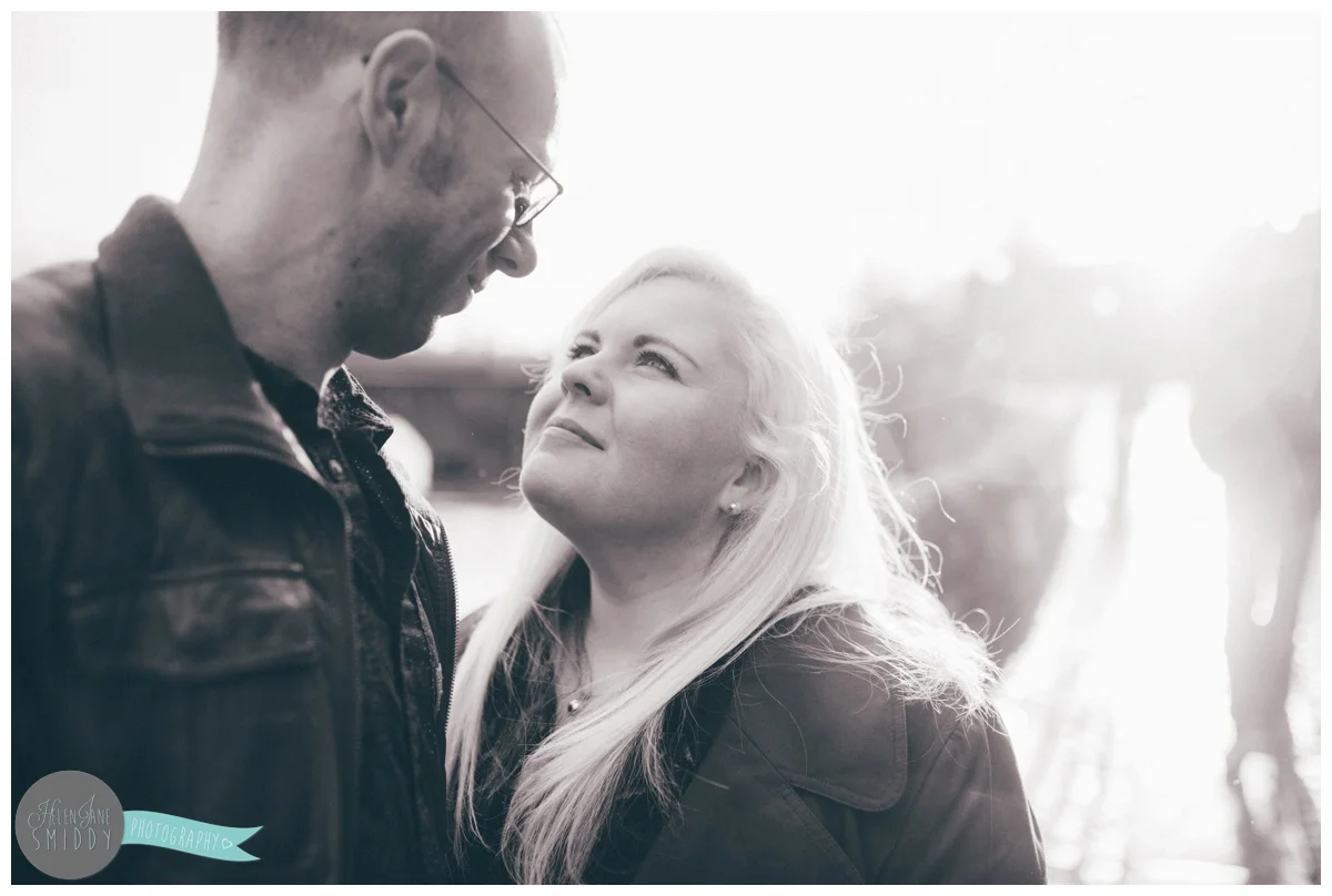 Close-up of Jo and Alan looking at each other in Chester City Centre during their engagement shoot.