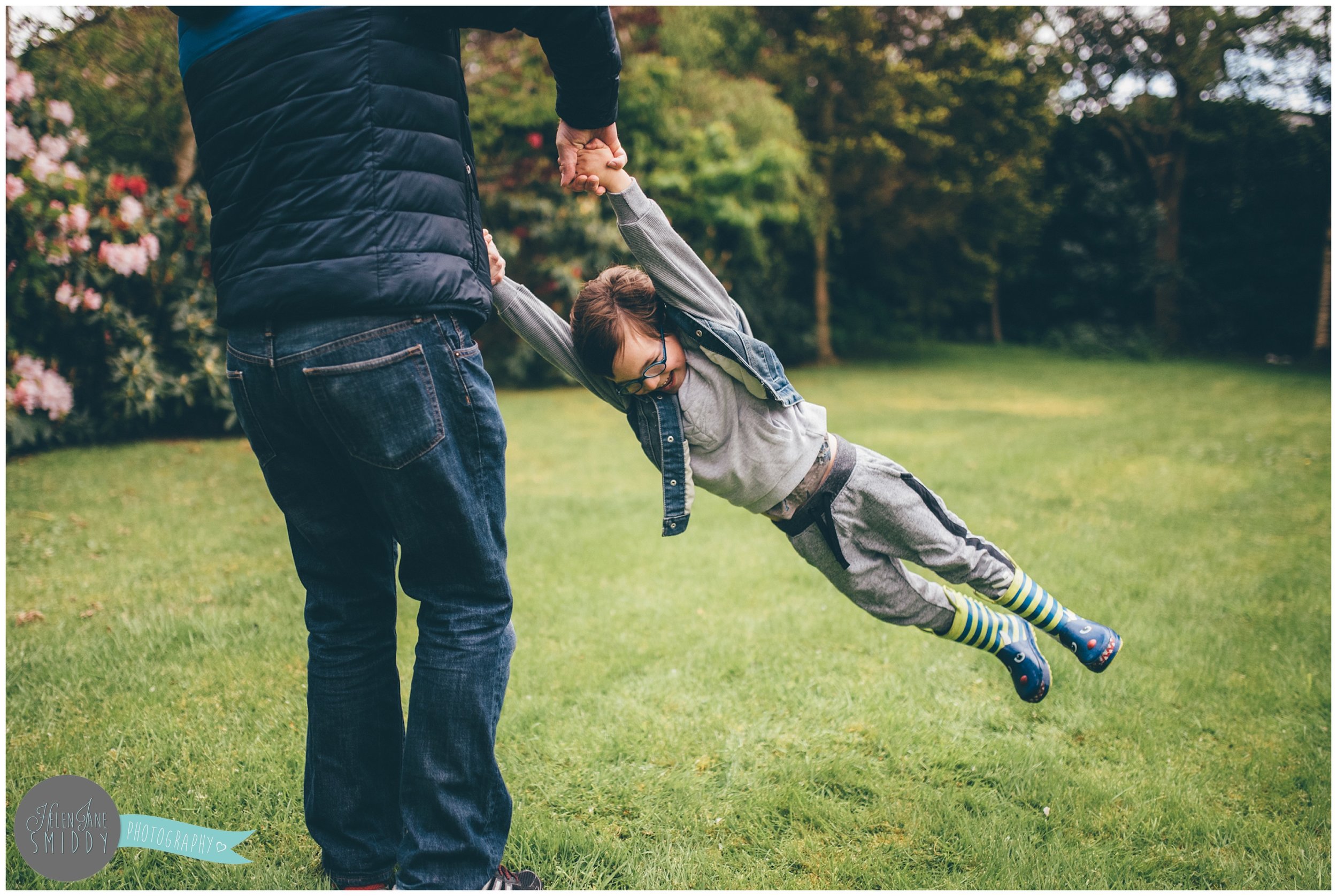 Family time in their Frodsham garden during an A Day In The Life photoshoot in Cheshire.