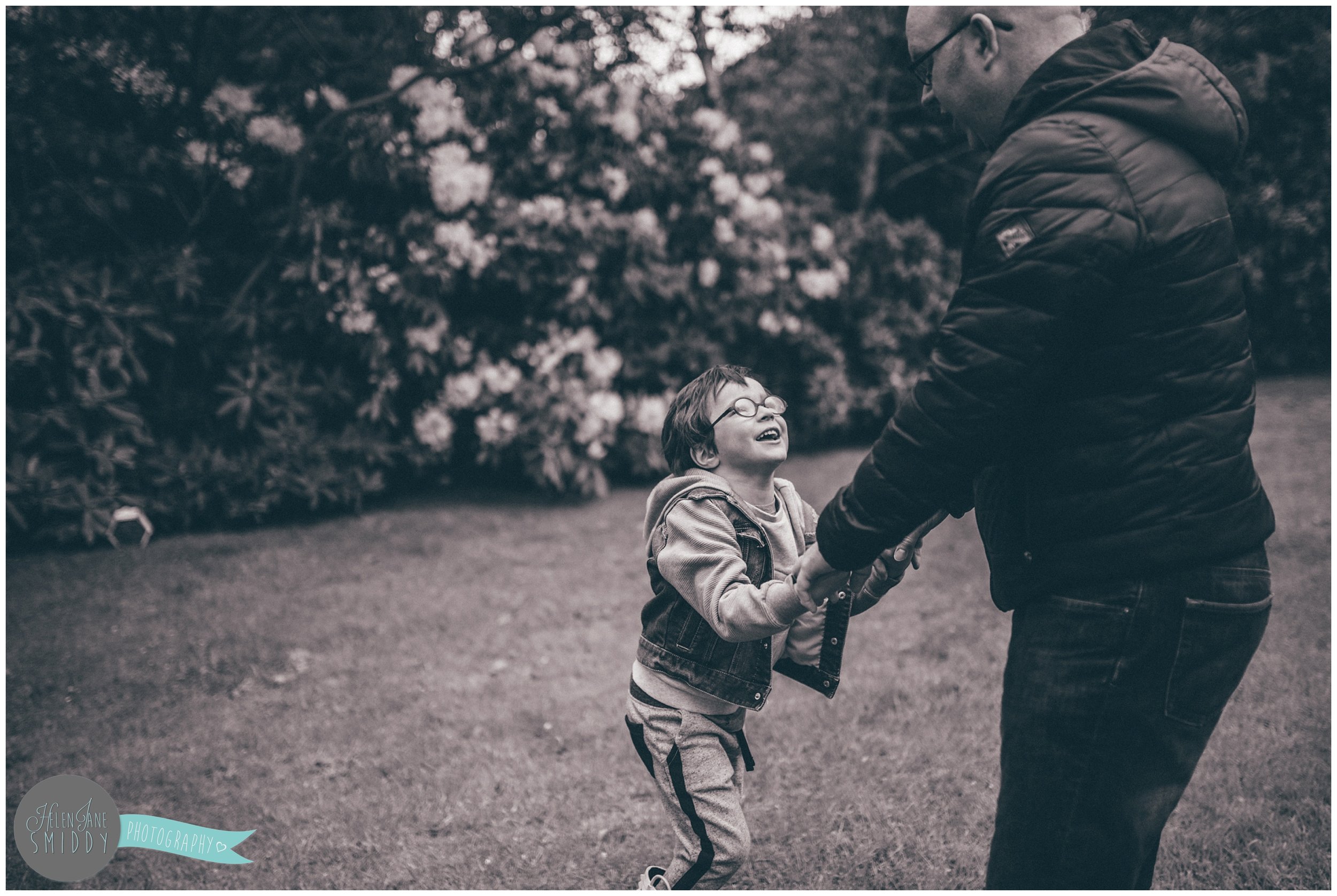 Family time in their Frodsham garden during an A Day In The Life photoshoot in Cheshire.