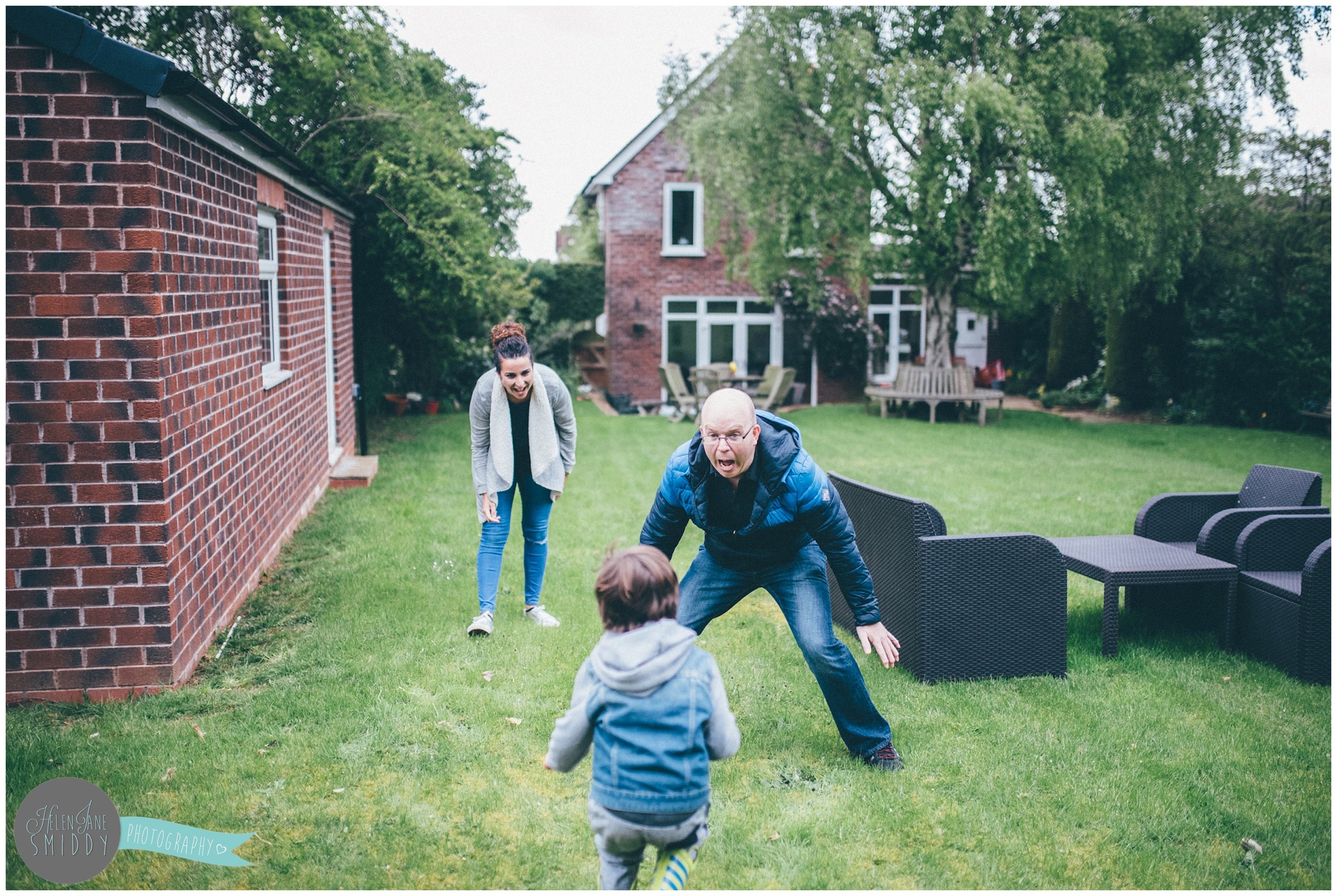 Family time in their Frodsham garden during an A Day In The Life photoshoot in Cheshire.