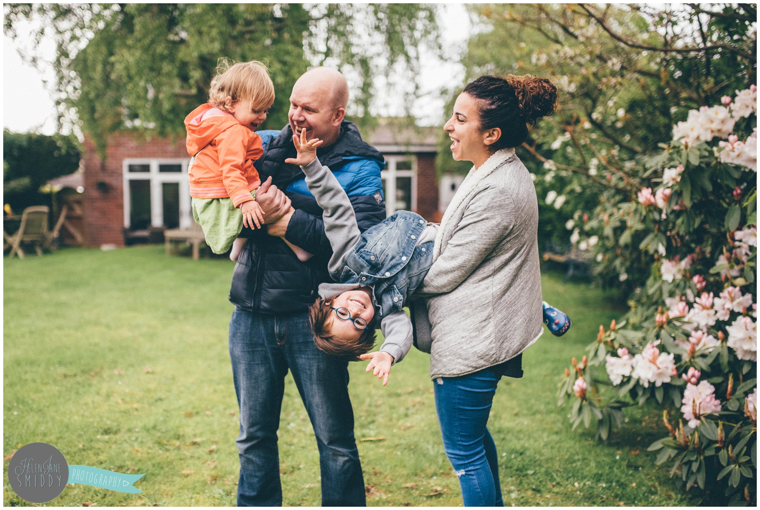 Family time in their Frodsham garden during an A Day In The Life photoshoot in Cheshire.