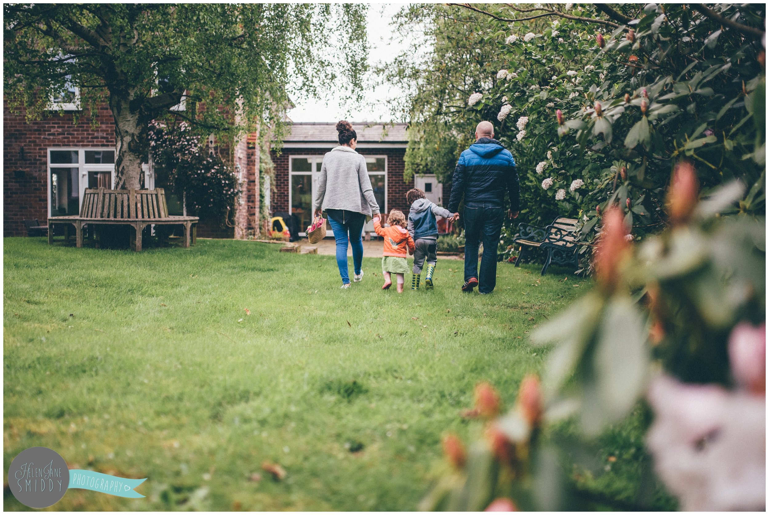 Family time in their Frodsham garden during an A Day In The Life photoshoot in Cheshire.