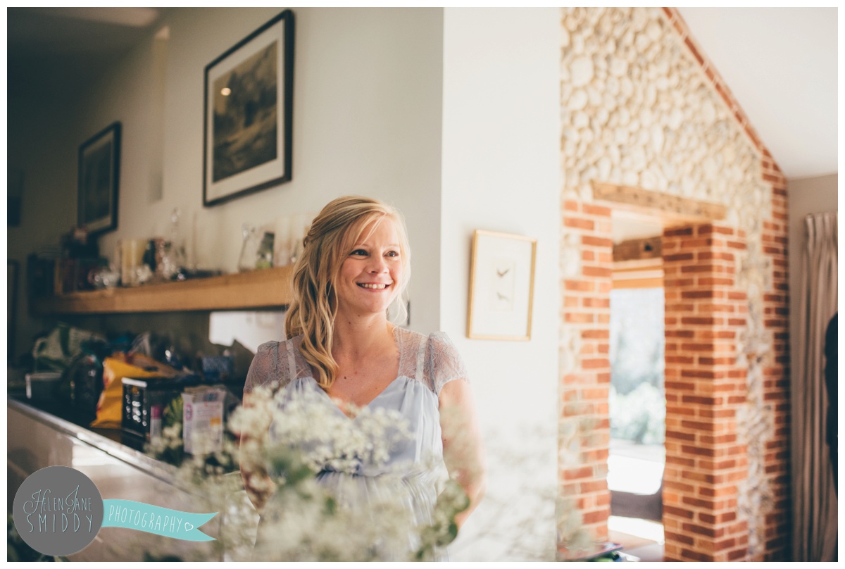 Beautiful, blooming pregnant bridesmaid at Barn Drift in Norfolk.