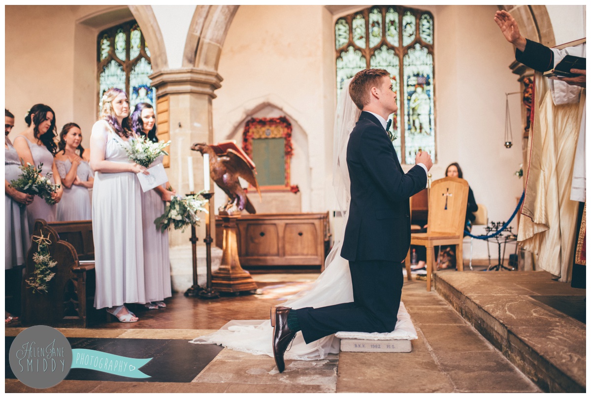 Bride and groom in church in Norfolk after their beautiful ceremony.