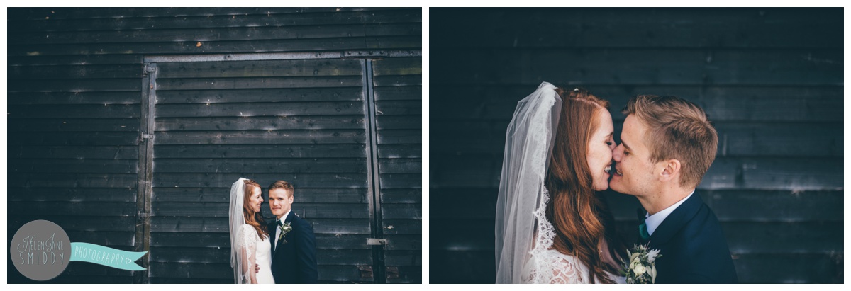 Bride and Groom kiss at their beautiful September wedding at Barn Drift in Norfolk.