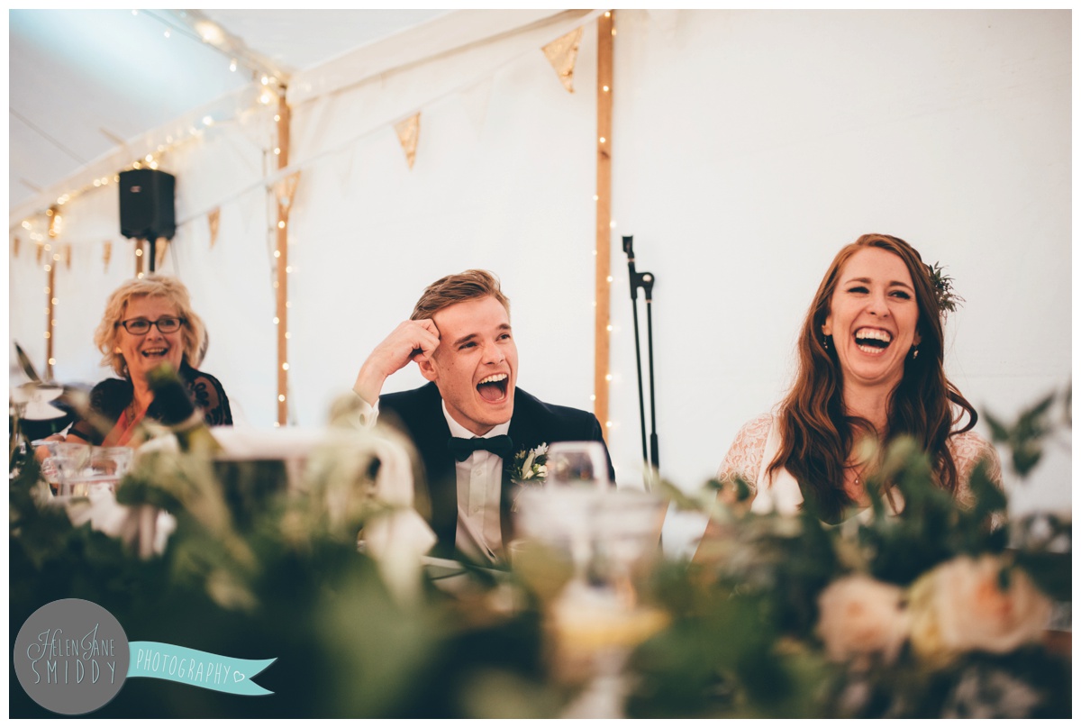 Wedding speeches shot by Cheshire wedding photographer at Barn Drift in Norfolk.