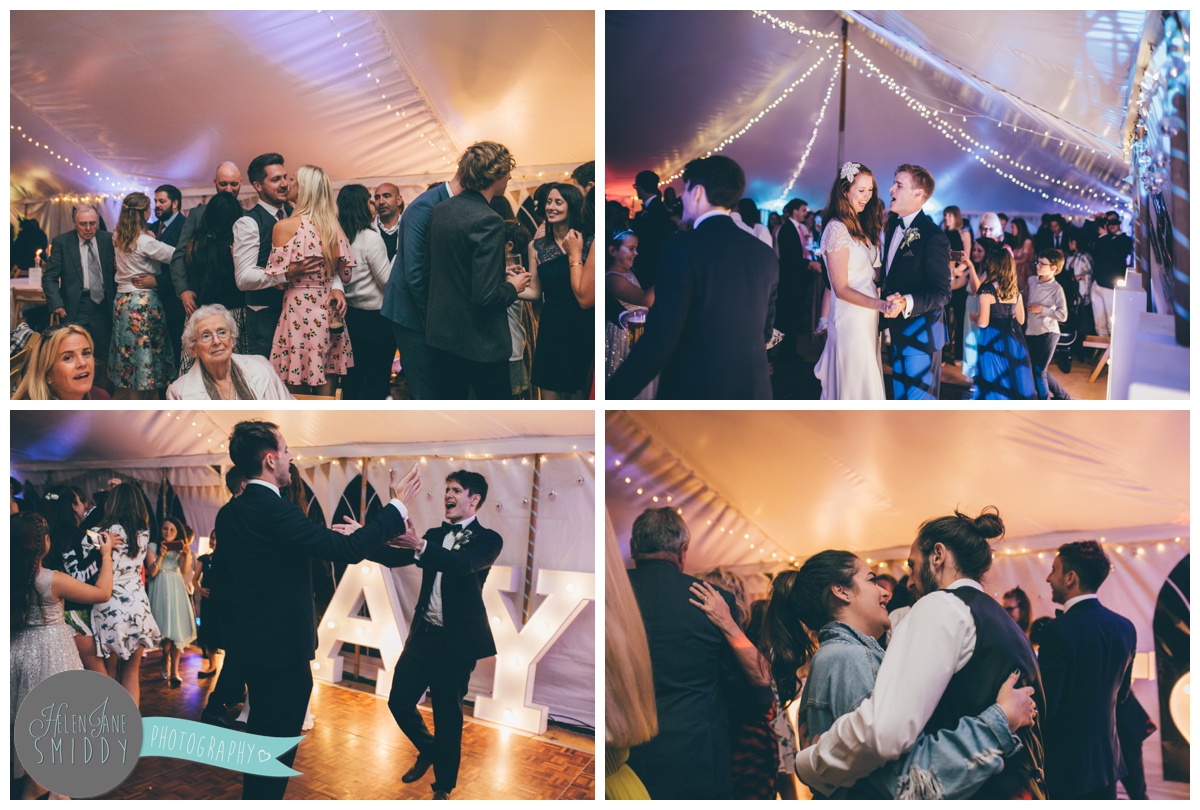 Wedding guests dancing at Barn Drift in Norfolk.