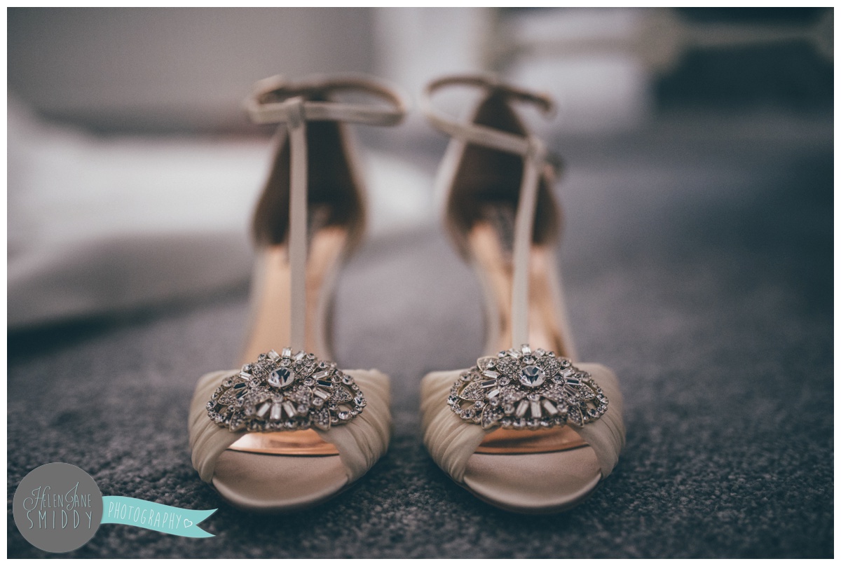 The jewelled detail on the bride's beautiful wedding shoes.