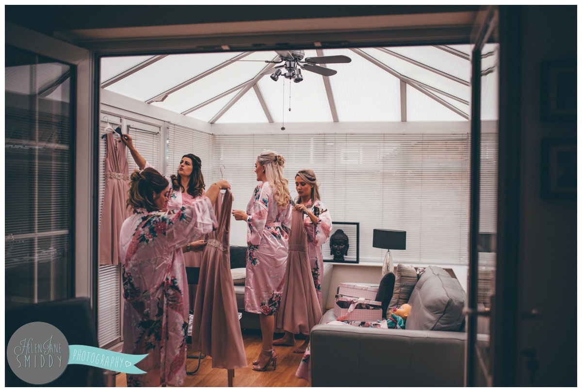 The bridesmaids getting ready for the wedding.