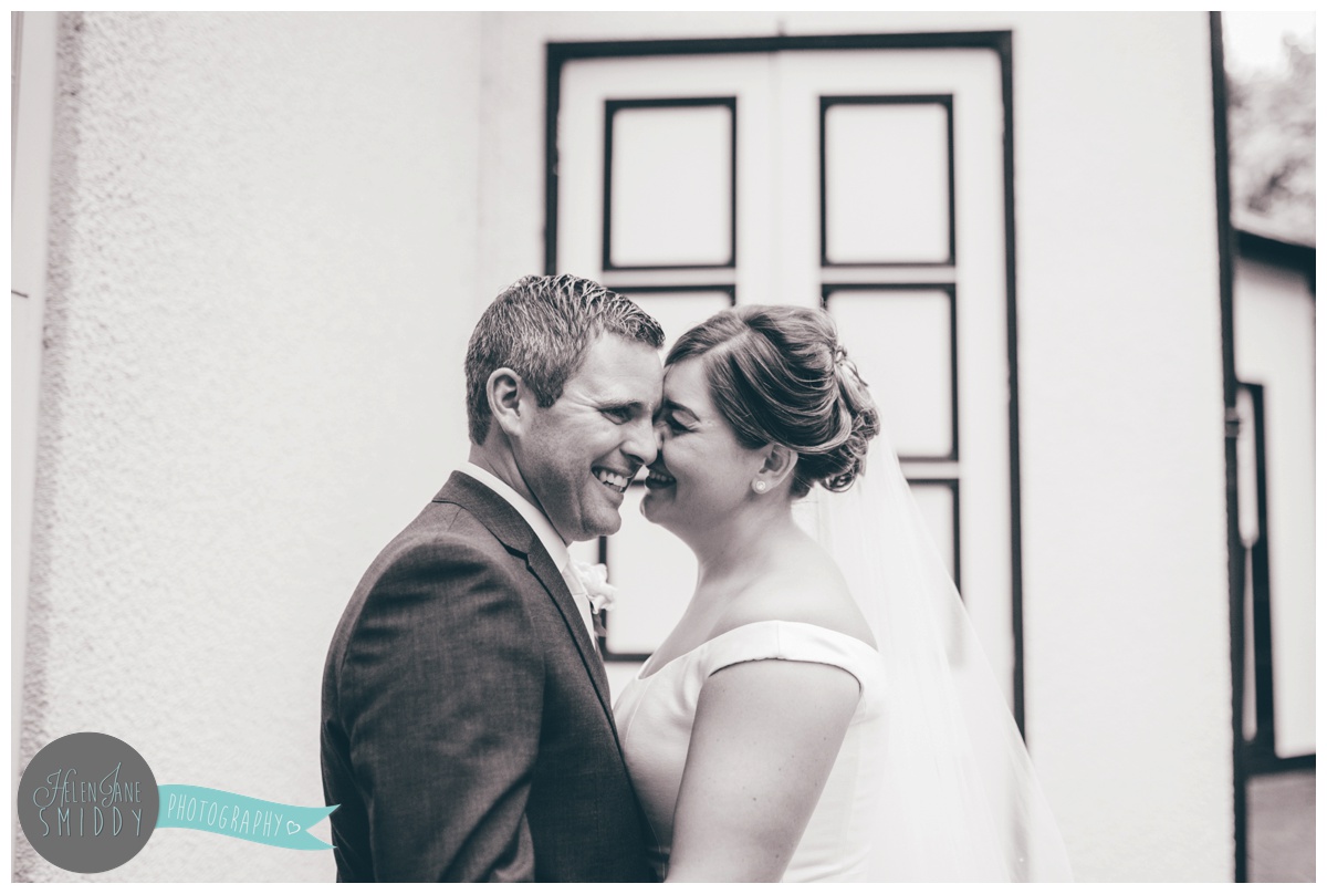 Bride and Groom share an intimate moment on their wedding day.