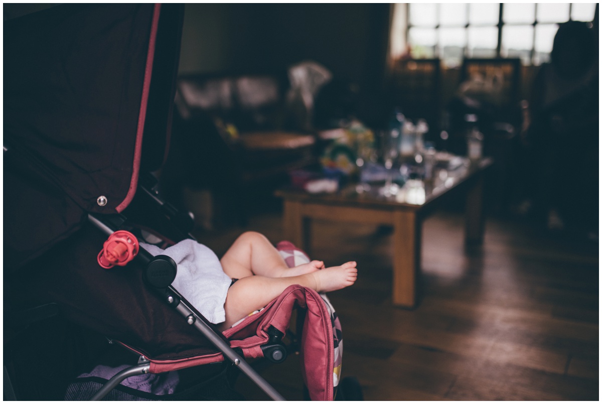 Cute sleeping flowergirl before the wedding ceremony at The Ashes wedding barn in Staffordshire.