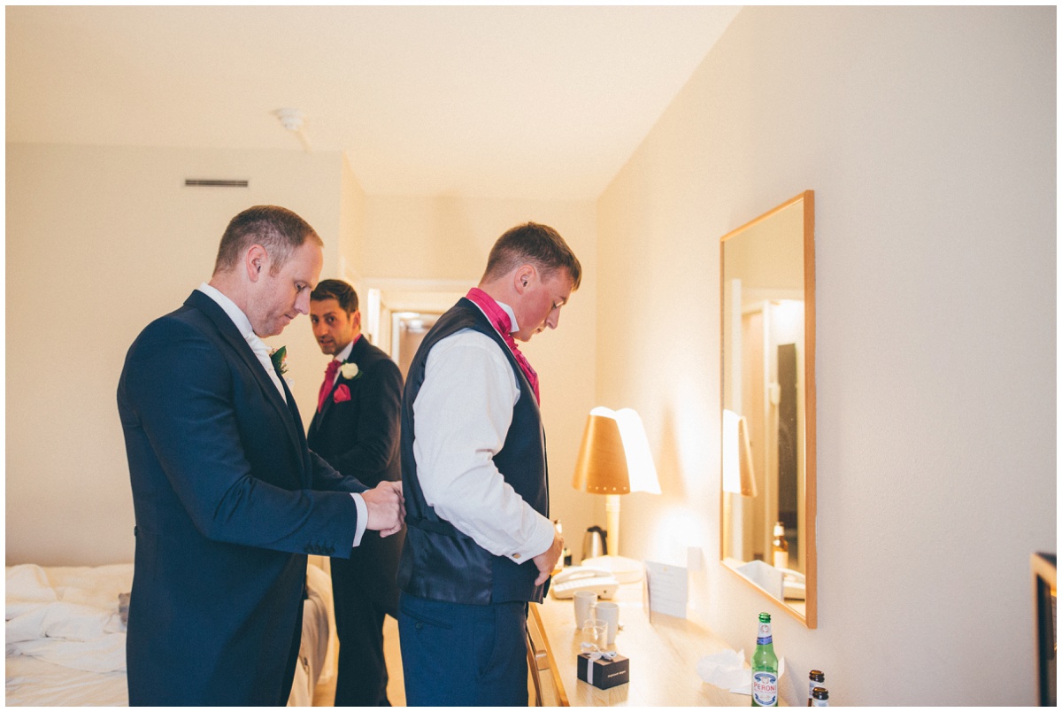 The groom and his ushers get ready on the morning of the Manchester wedding.