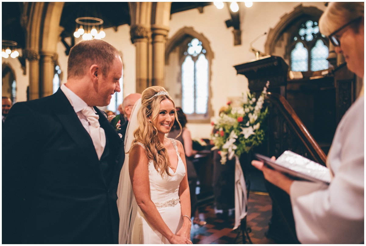 The bride and groom see each other for the first time at St Mark's Church in Worsley.