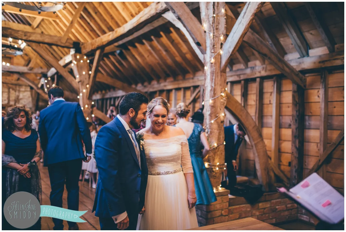 The bride and groom see each other for the first time at the top of the aisle at Bassmead Manor.