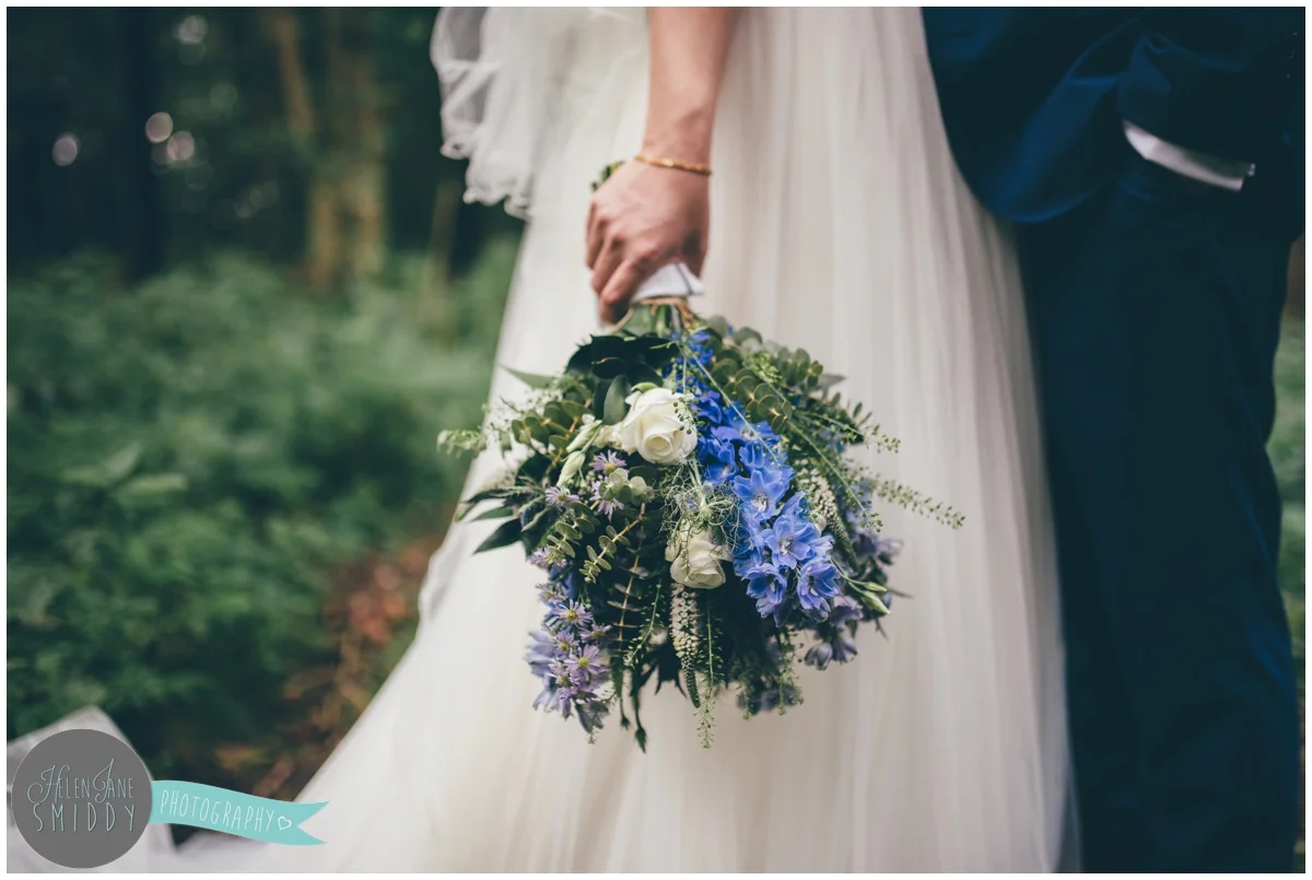 The bride's stunning wild wedding bouquet at Bassmead Manor in Cambridgeshire.