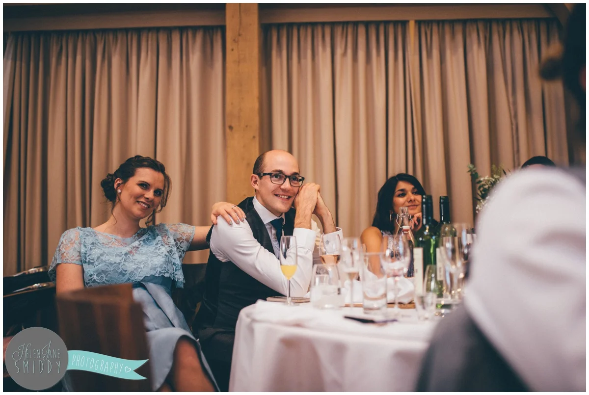 Guests enjoy the Wedding speeches at Bassmead Manor wedding barns.