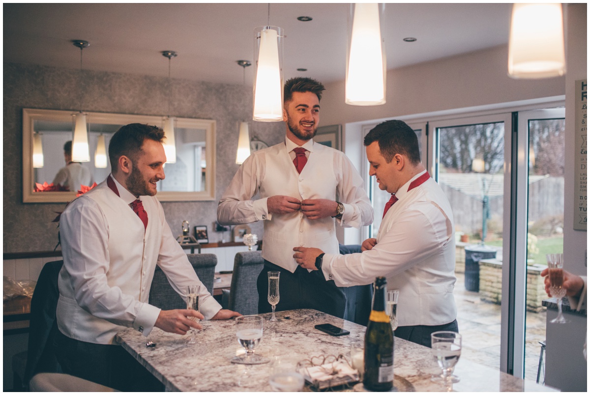 The groomsmen finish getting themselves ready for the Big Day.