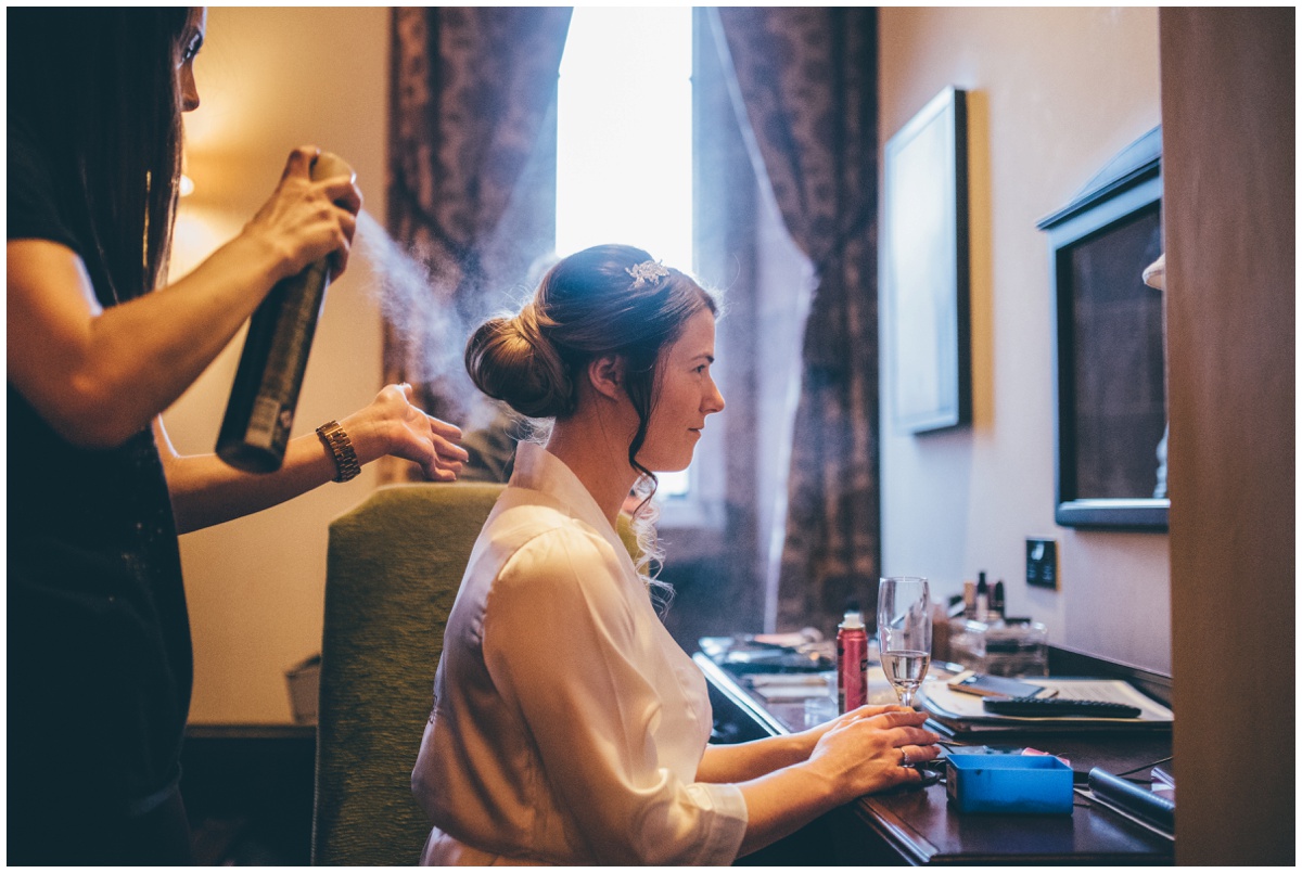 Sarah gets the finishing touches to her hair completed.