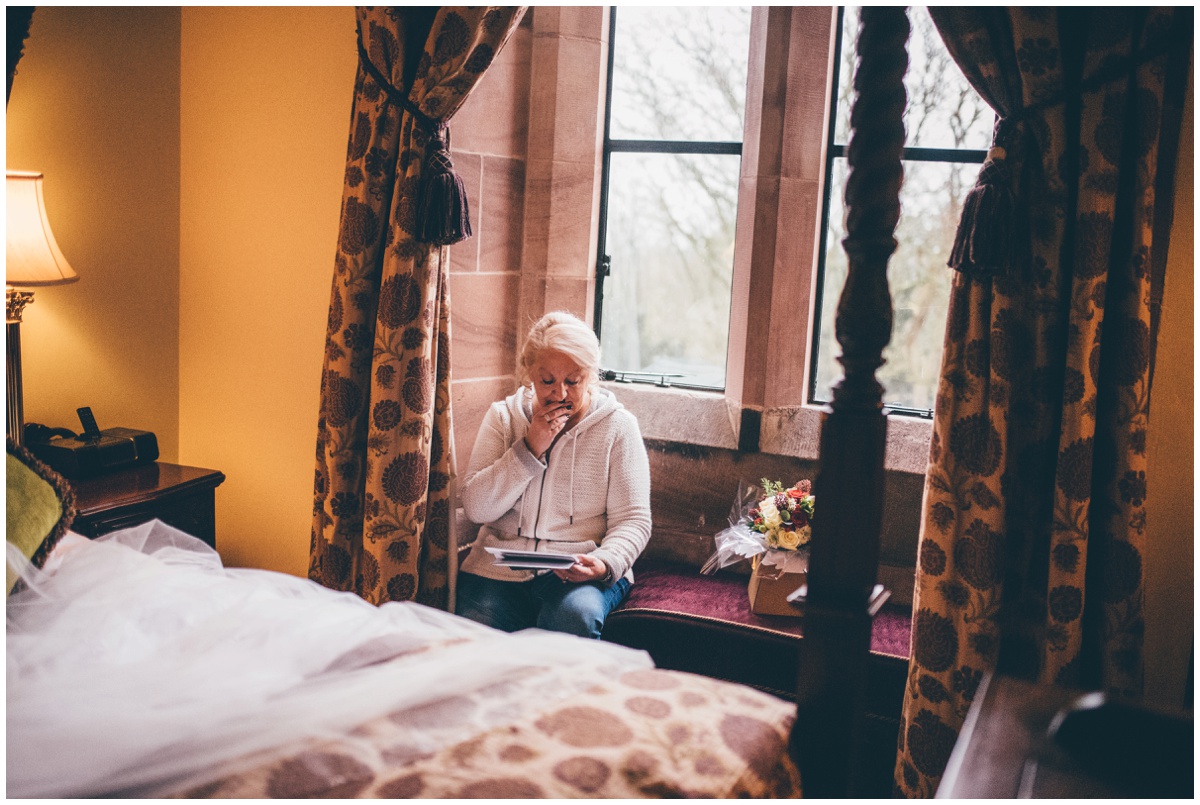 Groom's mother read beautiful card on the wedding morning at Peckforton Castle.