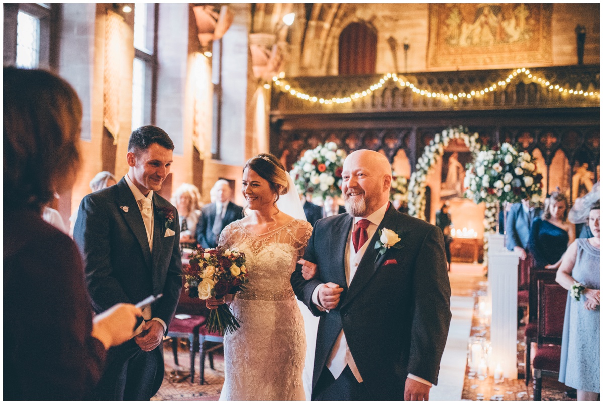 The bride greets the groom at Peckforton Castle.