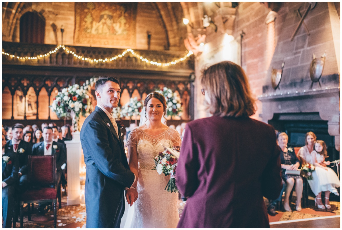 Cute photograph during the ceremony at Peckforton Castle.