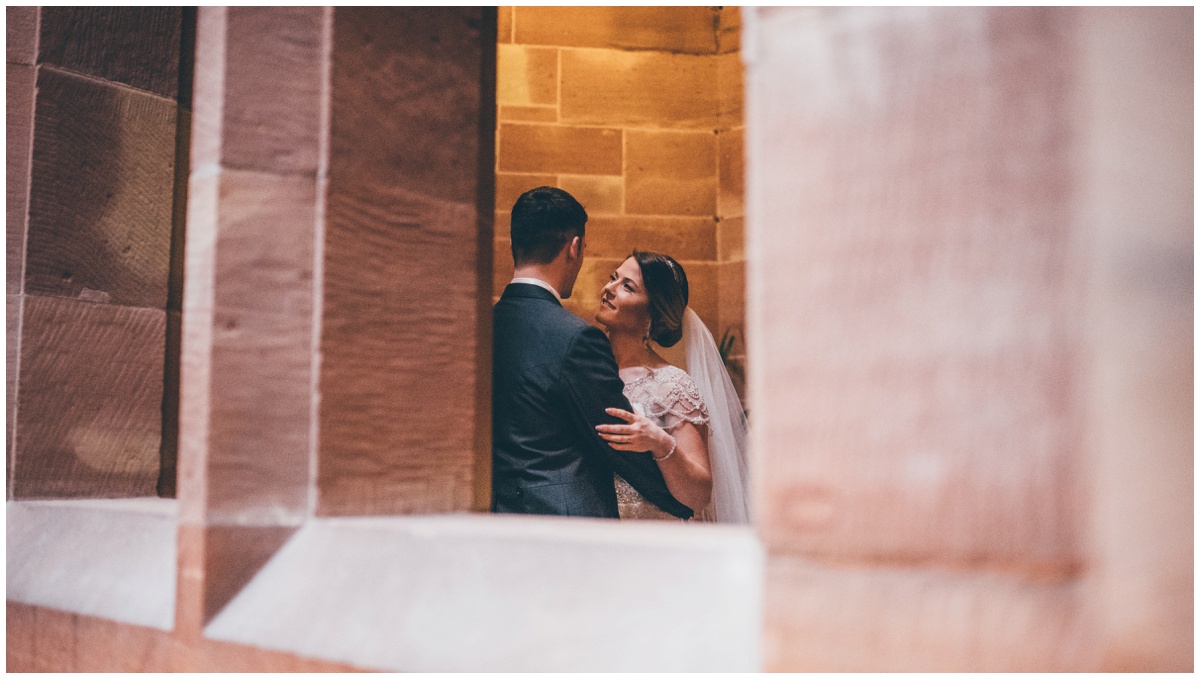 The couple have their photographs taken at Peckforton Castle.