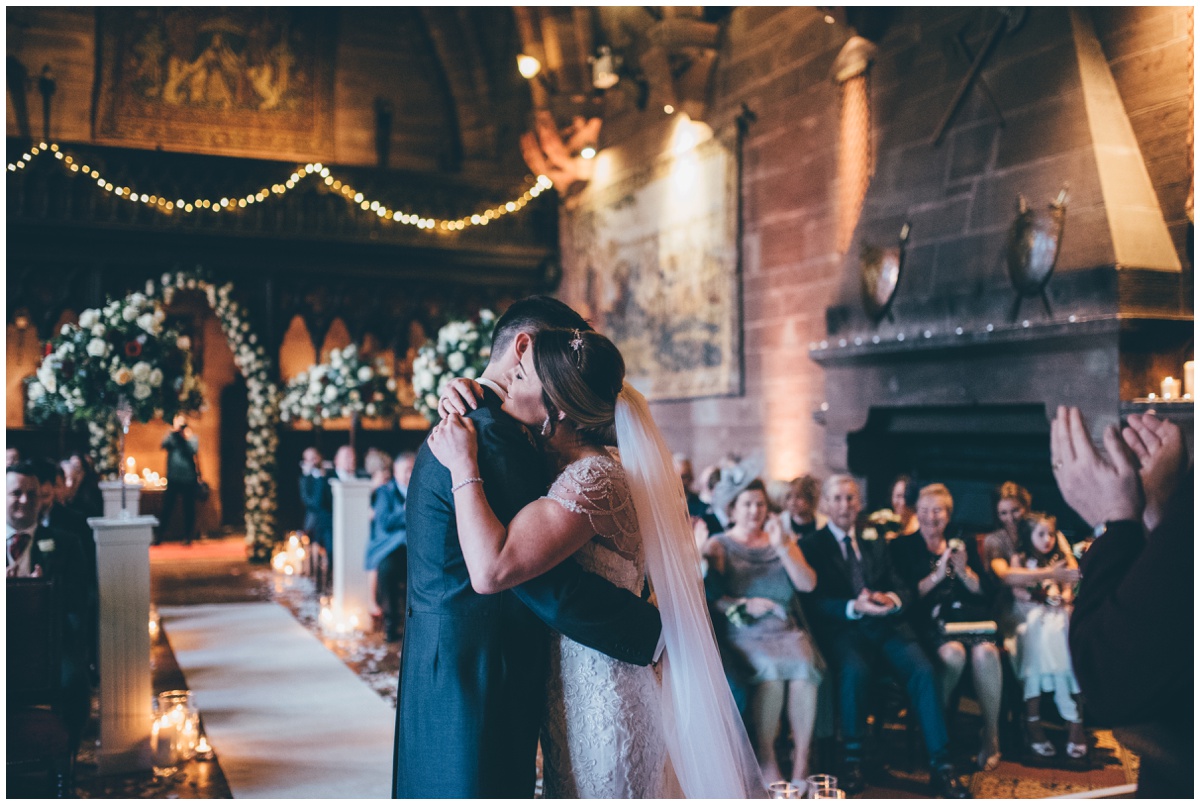 The newlyweds share a cuddle after they are announced husband and wife.