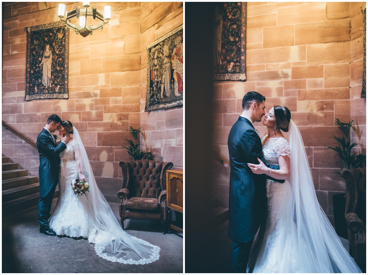 Beautiful bridal portraits in the corridors at Peckforton Castle.