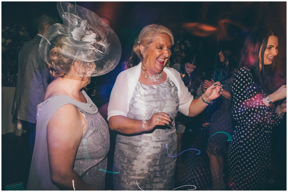 Guests dance the night away at Peckforton Castle wedding.