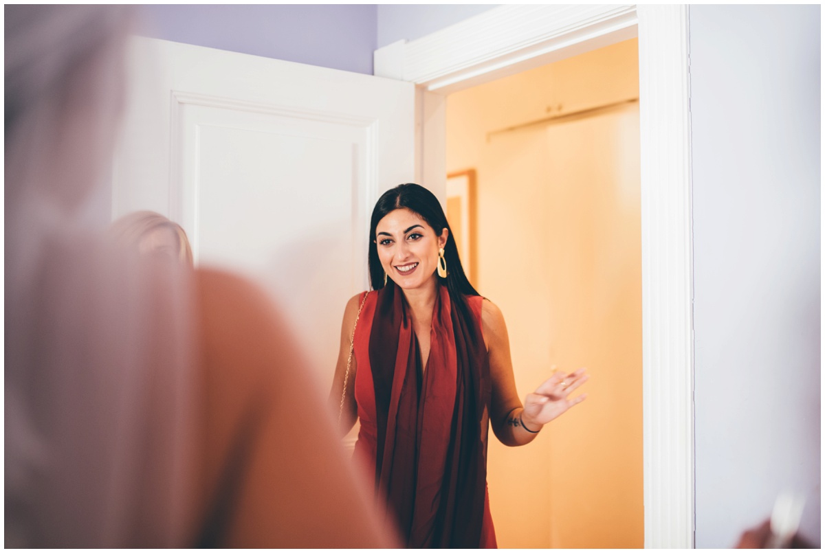 Guests see the bride for the first time in her wedding gown.