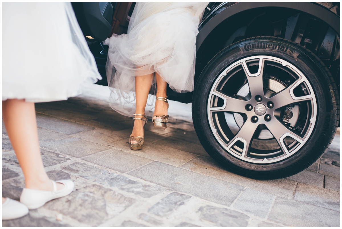 Italian bride arrives at her wedding in Italy.