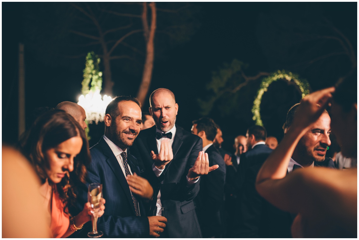 Italian wedding guests enjoying the reception.