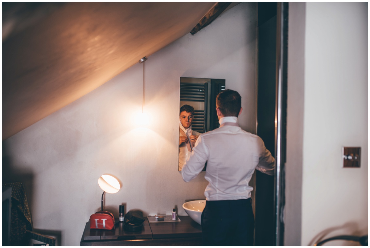 Groomsman gets ready at Oddfellows in Chester.
